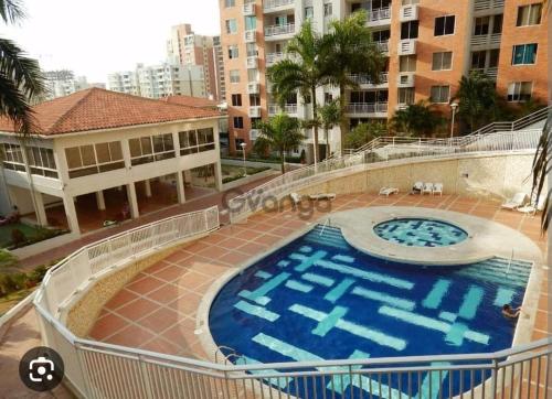 a view of a swimming pool on top of a building at Apto Torres de Montreal in Barranquilla