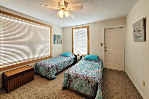 Ένα ή περισσότερα κρεβάτια σε δωμάτιο στο 108 Seaway Bungalow