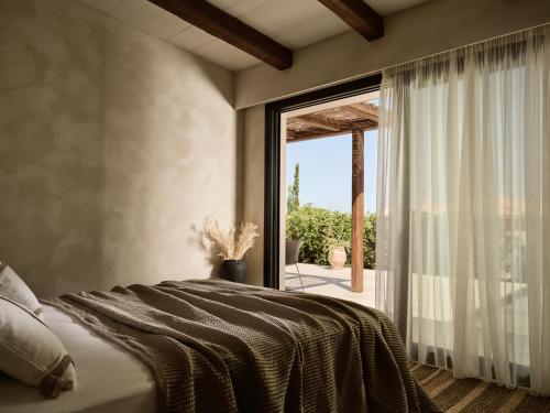 Ένα ή περισσότερα κρεβάτια σε δωμάτιο στο Ananta Blue Residence