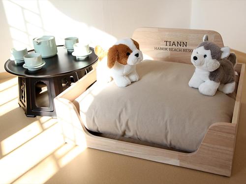 Una cama o camas en una habitación de Hotelarrive Taean Tiann HanokBeachResort