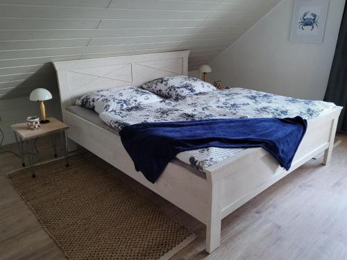 Postel nebo postele na pokoji v ubytování Wohnung mit Wintergarten