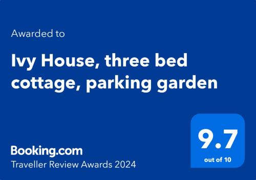 ein blauer Bildschirm mit den Worten mein Haus drei Betten Cottage parkgarten in der Unterkunft Ivy House, three bed cottage, parking garden in Skipsea