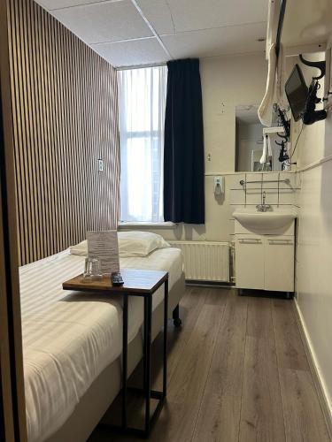 Una cama o camas en una habitación de Hotel Hortus