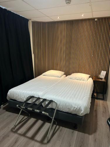 Una cama o camas en una habitación de Hotel Hortus