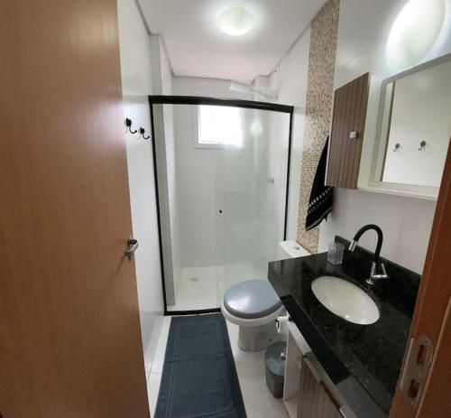 Een badkamer bij Apartamento aconchegante PG