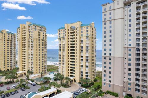 an aerial view of tall buildings in front of the ocean at Beach Colony West 1B in Perdido Key