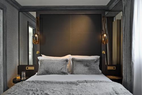 Voodi või voodid majutusasutuse Les 2 chalets - Les appartements du Strato toas