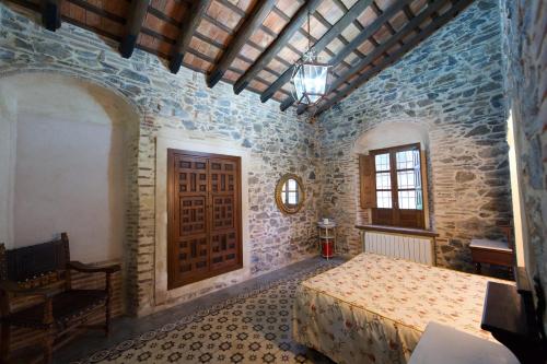 Ένα ή περισσότερα κρεβάτια σε δωμάτιο στο Paraiso del Hueznar