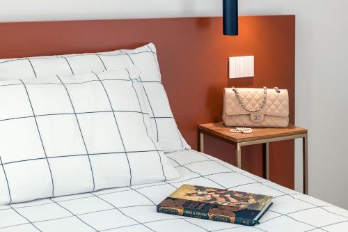 Postel nebo postele na pokoji v ubytování Grand Hotel Majestic