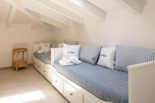 Postel nebo postele na pokoji v ubytování Lara Maison