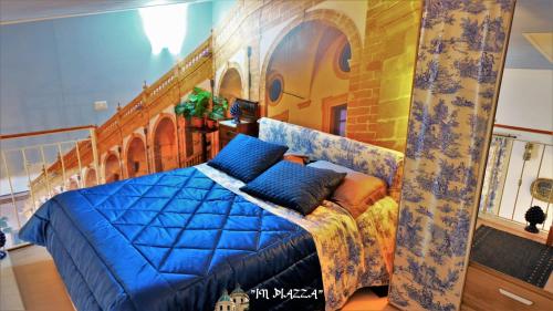 Tempat tidur dalam kamar di IN PIAZZA