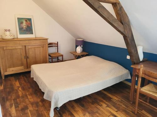 Postel nebo postele na pokoji v ubytování La ferme Des Cosses