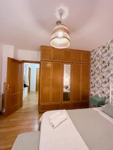 Katil atau katil-katil dalam bilik di Apartamento Suite Los Deportes
