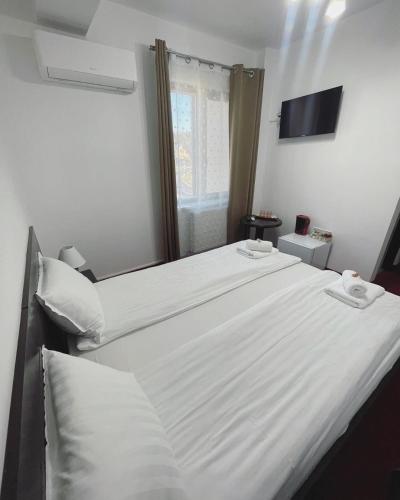 Apartamente 9 - Naomiにあるベッド