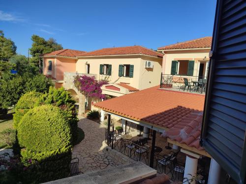 an overhead view of a house with a patio at Elanthi Village Apartments in Kalamaki