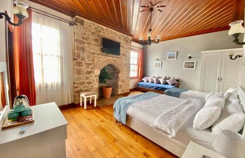 Postel nebo postele na pokoji v ubytování Ulivo Hotel
