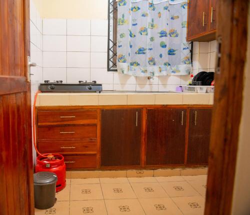 Kuchyň nebo kuchyňský kout v ubytování Clarine Cozy Holiday Home