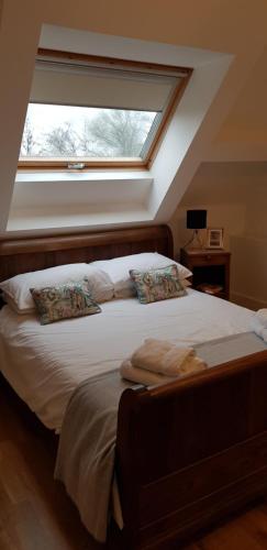 מיטה או מיטות בחדר ב-Maison de la Grange, Chaulieu