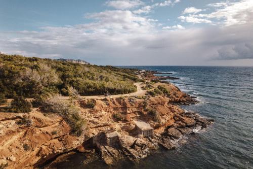 a path on the side of a rocky cliff at ES CUCONS RURAL HOTEL in San Antonio
