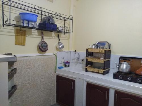 Кухня или мини-кухня в Casa Di Medina
