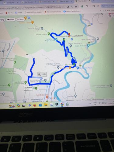 a laptop computer screen with a map on it at Tranquility Estate in Kingston
