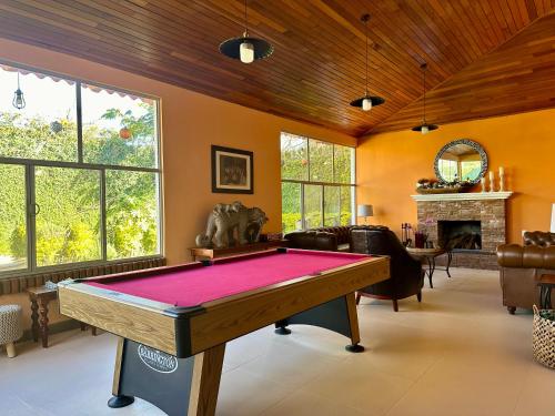 a living room with a pool table in it at Habitación agradable in Comitán