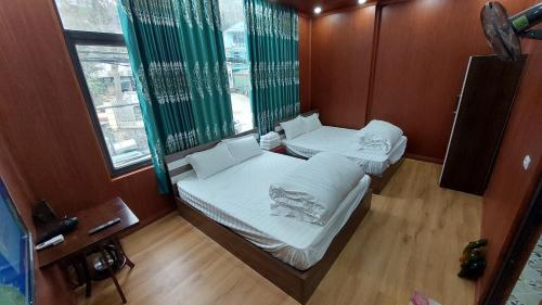 Katil atau katil-katil dalam bilik di Melody Homestay
