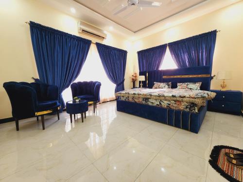 Ruang duduk di Motorway Majesty Lodges - Near Islamabad International Airport & Motorway