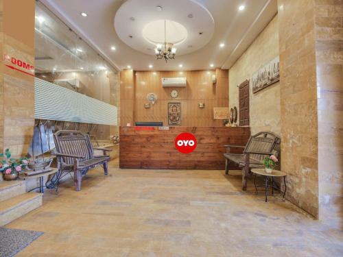 a salon with two chairs and a stop sign on the wall at OYO Hotel Yellow Stone in Patiāla