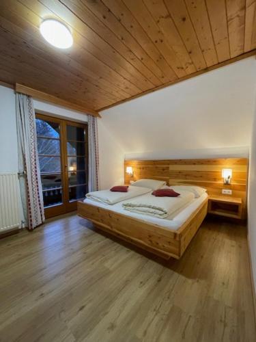 Postel nebo postele na pokoji v ubytování Gasthof Thurnerhof
