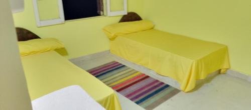 Cama ou camas em um quarto em Kamel House