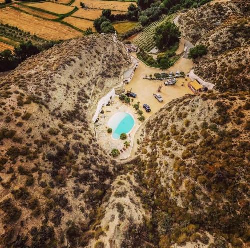 an aerial view of a resort on a mountain at Cueva Aventura in Benamaurel