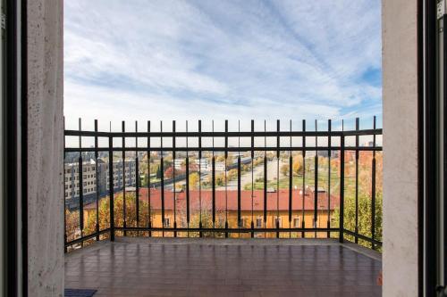 a view of a city from a balcony at HACCA Collection - Isola 1BR in Milan