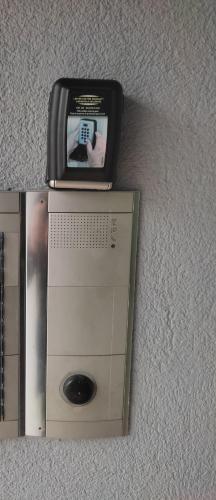 a clock sitting on top of a box at gite st nicolas in Freyming