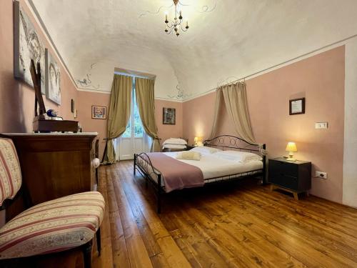 Posteľ alebo postele v izbe v ubytovaní Cascina Vicentini