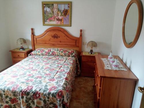 Een bed of bedden in een kamer bij Piso de 4 habitaciones