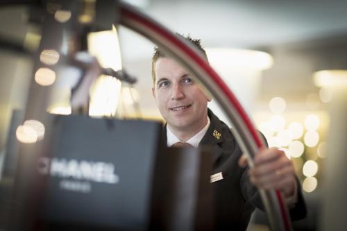 a man in a military uniform holding a racket at Mercure Melbourne Albert Park in Melbourne