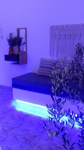 Ein Bett oder Betten in einem Zimmer der Unterkunft Papafotis Apartments & Suites
