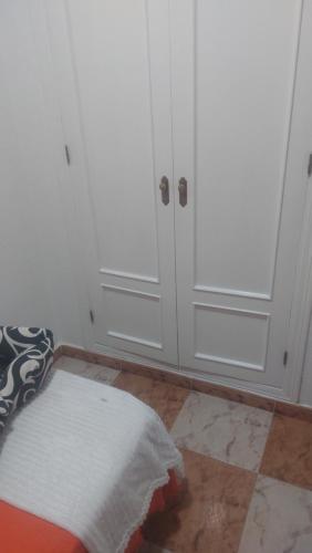 Ein Bett oder Betten in einem Zimmer der Unterkunft Villa Pilarin