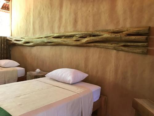 Postel nebo postele na pokoji v ubytování Casa Amazonas