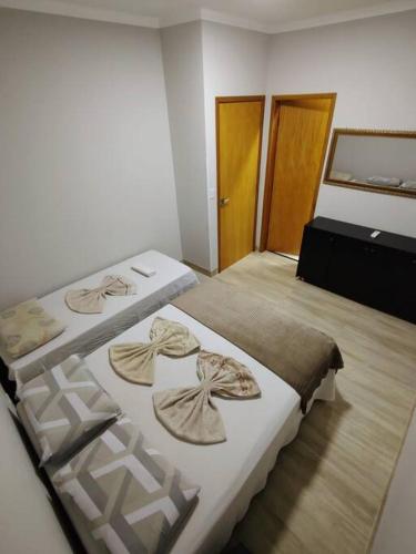 Ένα ή περισσότερα κρεβάτια σε δωμάτιο στο Casa luxuosa em região central (Próximo ao Aeroporto)
