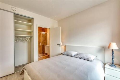 Postel nebo postele na pokoji v ubytování Splendide appartement au centre de Liège - Complexe PARADIS EXPRESS