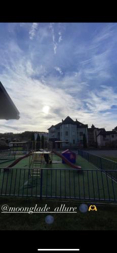 a view of a playground with a playground at Moonglade Allure Houses in Polyana