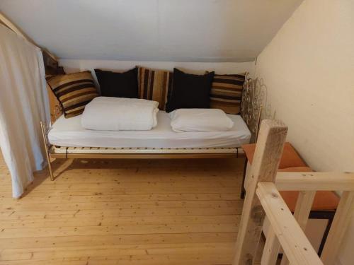 En eller flere senge i et værelse på Gîte de l’impluvium au coeur des volcans Auvergne