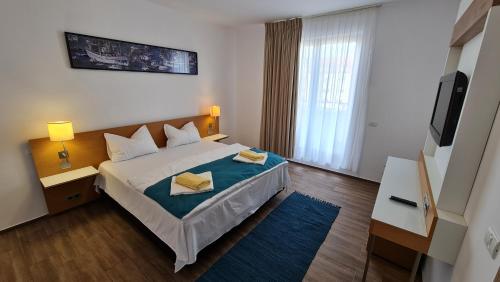 Ένα ή περισσότερα κρεβάτια σε δωμάτιο στο Jafar Resort 10 Penthouse