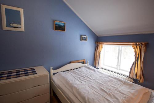 Postel nebo postele na pokoji v ubytování Gopshusgården - Rum & Stugor