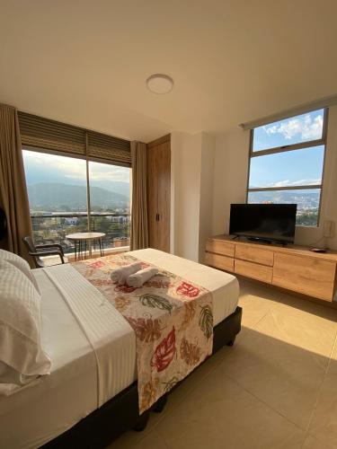 Caliview Apartahotel Andalayaにあるベッド