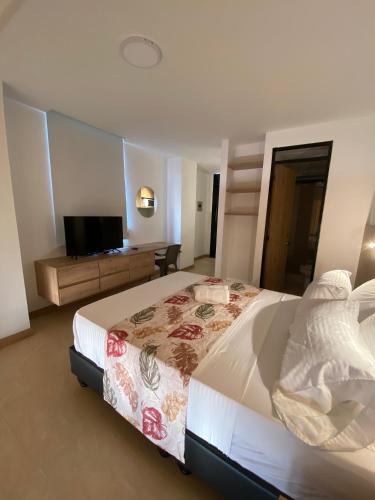 Caliview Apartahotel Andalayaにあるベッド