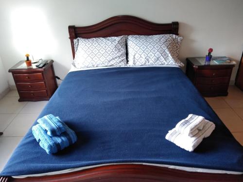 Una cama o camas en una habitación de Hostal Norma101