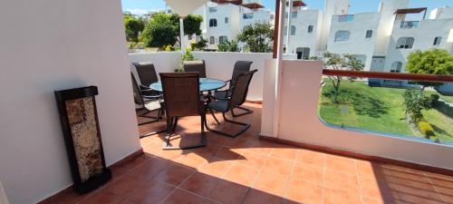 Paraíso Teques, Casa entera con acceso al lagoにあるバルコニーまたはテラス
